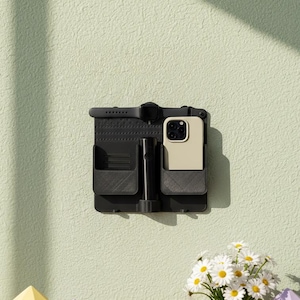 3D Printed Wall Mounted Charging Station: Dual Phone, Watch & Remote Organizer image 4