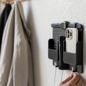 3D Printed Wall Mounted Charging Station: Dual Phone, Watch & Remote Organizer image 3