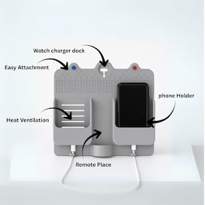 May include: A grey charging station with a phone holder, watch charger dock, and remote place. The station has easy attachment and heat ventilation features. A black smartphone is in the phone holder, and white charging cables are connected.