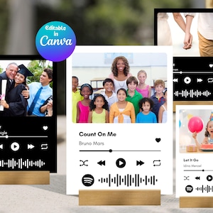 May include: Four rectangular acrylic plaques featuring custom photo prints and music player interface graphics. Each plaque displays a song title, artist name, playback controls, and a sound wave icon, all mounted on small, rectangular wooden stands.