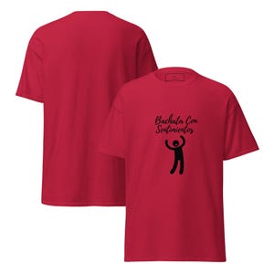 May include: Red t-shirt with the text "Bachata Con Sentimientos" and a black stick figure dancing. The shirt has a classic crew neck and short sleeves. The image shows the front and back of the shirt.