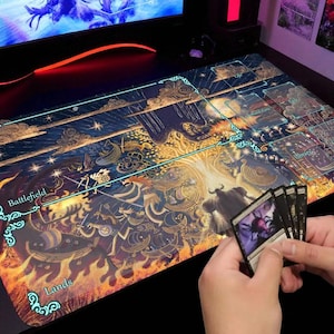 May include: A gaming mousepad with a fantasy art design. The mat features a detailed illustration with a battlefield scene, including warriors, a tree, and a fiery landscape. The mat is rectangular and has designated zones for gameplay.
