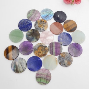 May include: Assortment of 18 round, polished gemstone coasters in various colours and patterns, including green, blue, purple, brown, and white. The coasters are made of natural stone and are approximately 5 cm in diameter.