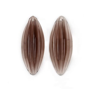 May include: Two dark gray glass teardrop-shaped beads with a ribbed texture.
