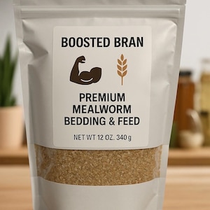 May include: A white pouch with a clear window, filled with brown mealworm bedding and feed. The label reads "Boosted Bran" with a flexing arm and wheat icon. The net weight is 12 oz. (340 g).