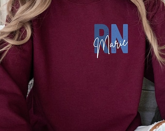 Custom Registered Nurse Sweatshirt With Name, Personalized RN Pocket Hoodie, Cute Nurse Gift, Nurse Life Outfit, Nurse Appreciation Clothing