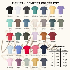 May include: A display of Comfort Colors 1717 t-shirts in various colors, including black, white, and red. The image includes a measurement chart with sizes ranging from S to 2XL, with widths from 18 1/4 inches to 26 inches and lengths from 26 3/5 inches to 31 3/5 inches.
