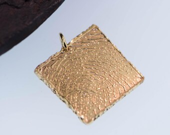 Square Fingerprint shaped Gold Charm.