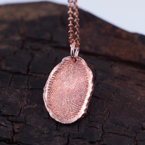 Rose Gold Natural Fingerprint Shaped Charm.