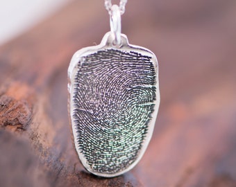 Natural Fingerprint shaped Silver Fingerprints Charm.