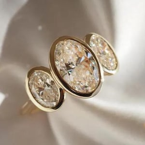 3 Stein Oval Moissanite Ring, Lünette Set Verlobungsring, Einzigartige Gold Moissanite Ring, Moderne Oval Cut Ring für Sie, Minimalist Brautring