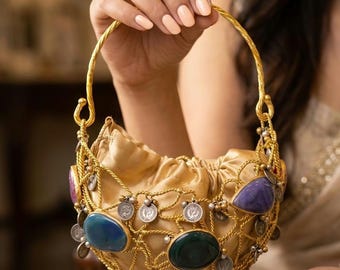 KANTH Heritage Golden Potli Bag with Antique Coin Hangings and Multi-Colored Statement Stones