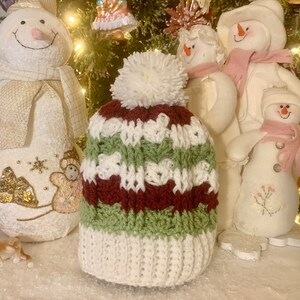 Beautiful crimson olive and warm winter white crochet pom pom beanie hat