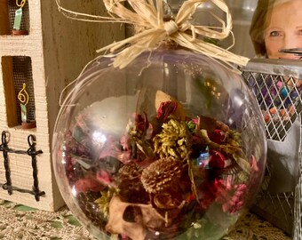 Beautiful four inch plastic globe potpourri Christmas ornament