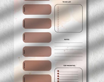 May include: A weekly planner with a watercolour design. The planner has sections for each day, a to-do list, notes, and top priorities. The text "Weekly Planner" and "Daily Planner" are visible.