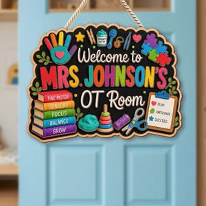May include: A hanging wooden sign with a black background featuring the text Welcome to MRS. JOHNSON'S OT Room. It includes colorful illustrations of a hand, puzzle pieces, a stack of books labeled Fine Motor, Sensory, Focus, Balance, Grow, and a clipboard.