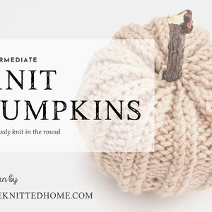 May include: A knitted pumpkin in beige and white with a wooden stem. The text "INTERMEDIATE KNIT PUMPKINS seamlessly knit in the round pattern by ©THEKNITTEDHOME.COM" is displayed on a white background.