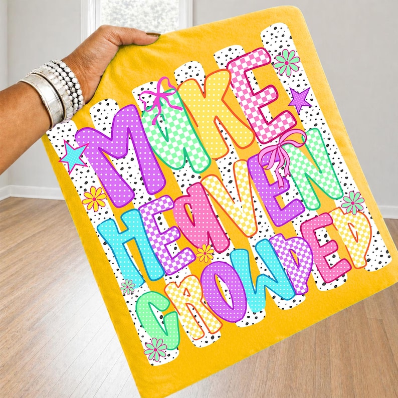 Detailed view of the 'Make Heaven Crowded' PNG featuring retro wavy typography and bright rainbow palettes, highlighting the high-quality hand-lettered feel.