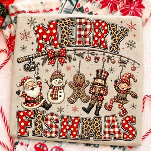 May include: A beige t-shirt featuring the text MERRY FISHMAS in red polka dot and leopard print patterns. A fishing rod hangs ornaments including a Santa Claus, a snowman, a gingerbread man, a nutcracker, and an elf, all with festive details.
