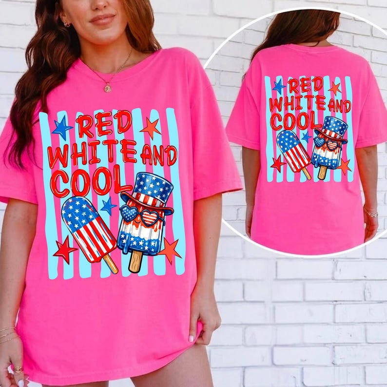 May include: A bright pink t-shirt featuring a graphic print with light blue vertical stripes and the text RED WHITE AND COOL. The design includes two popsicle illustrations, one wearing a top hat and heart-shaped sunglasses, accented by stars.