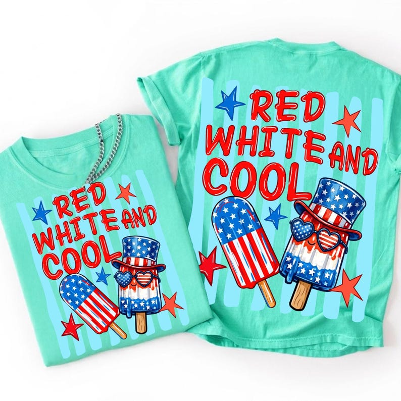 May include: A mint green t-shirt featuring a graphic of two popsicles with red, white, and blue star and stripe patterns. One popsicle wears a top hat and heart-shaped sunglasses. The text reads RED WHITE AND COOL in red letters.