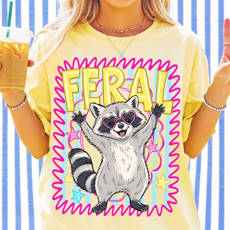 A close-up view of the Sassy Racoon PNG design, highlighting the details of the sunglasses and necklace.