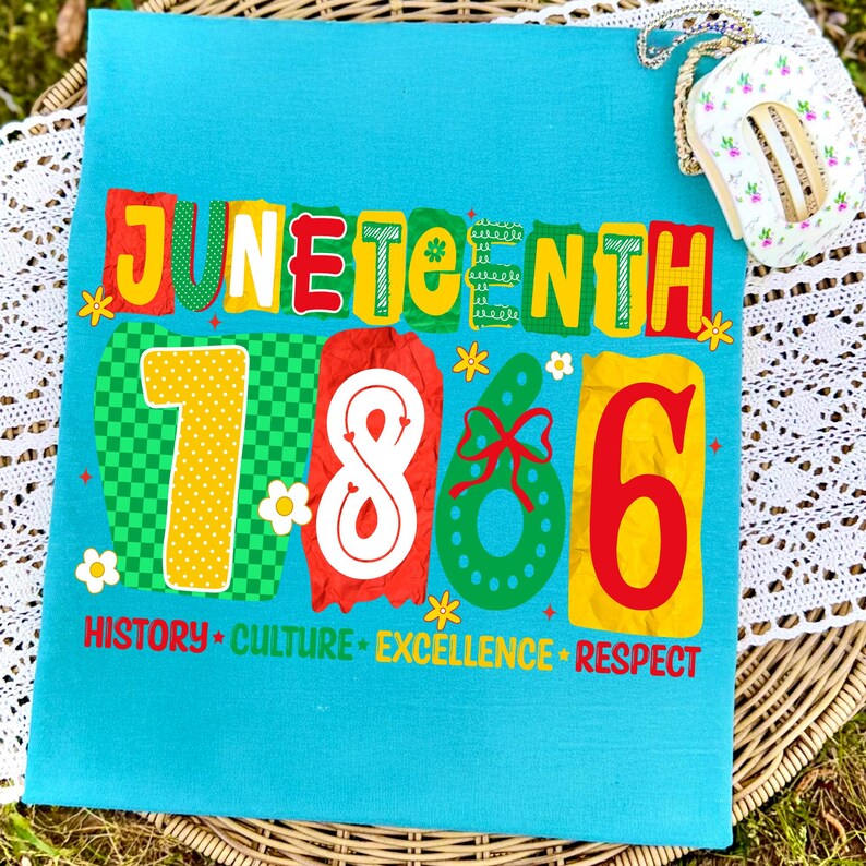 May include: A bright turquoise t-shirt featuring the text JUNETEENTH in colorful, textured block letters above the large numbers 1866. Below, the words HISTORY, CULTURE, EXCELLENCE, and RESPECT are printed in red, green, and yellow colors.