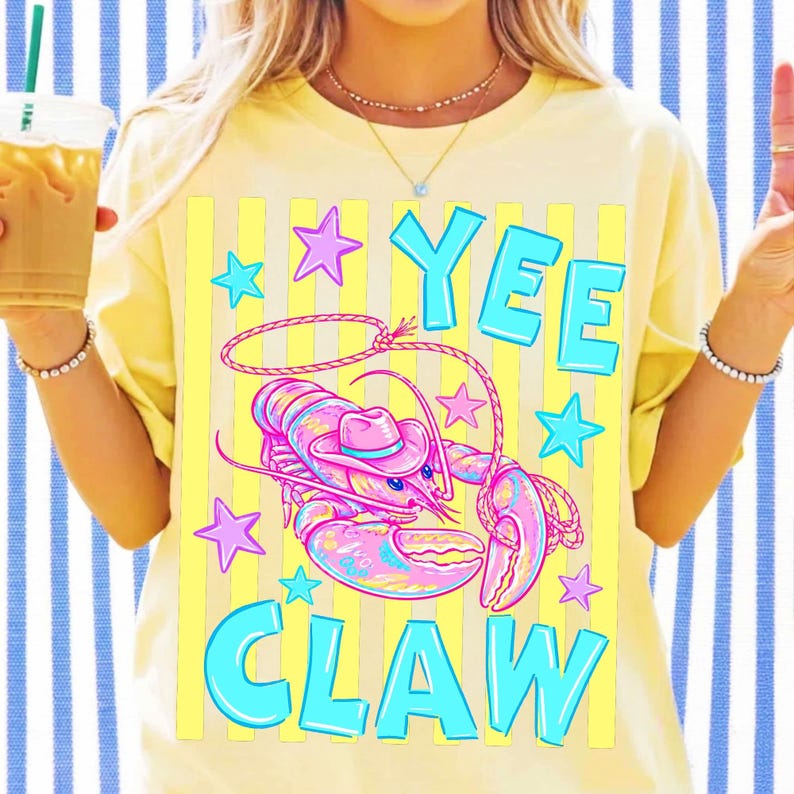 Creative 'Yee Claw' cowboy lobster design showcased on a personalized mug, ideal for crafters and gifts.