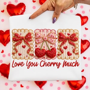 May include: White tote bag with embroidered red bows, cherries, and hearts. The text "Love You Cherry Much" is embroidered in red. The design is on a white background with a pink polka dot pattern and red heart-shaped balloons.
