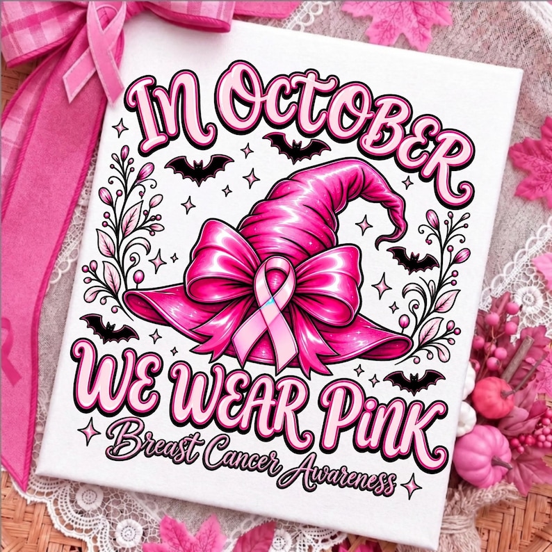 May include: A square canvas print featuring a bright pink witch hat adorned with a pink ribbon, surrounded by black bats, floral vines, and stars. The text reads: In October We Wear Pink Breast Cancer Awareness in black and pink lettering.