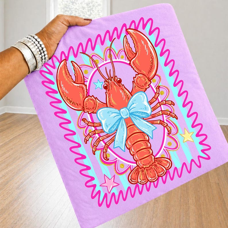 Mockup of a white t-shirt featuring the 'Crawfish Coquette' design with striped elements.