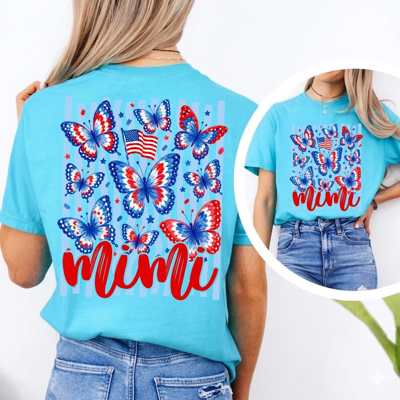 May include: A light blue t-shirt featuring a graphic print of multiple butterflies in red, white, and blue, a small American flag, and the word Mimi in red script. The design includes vertical stripes and small star accents on the fabric.
