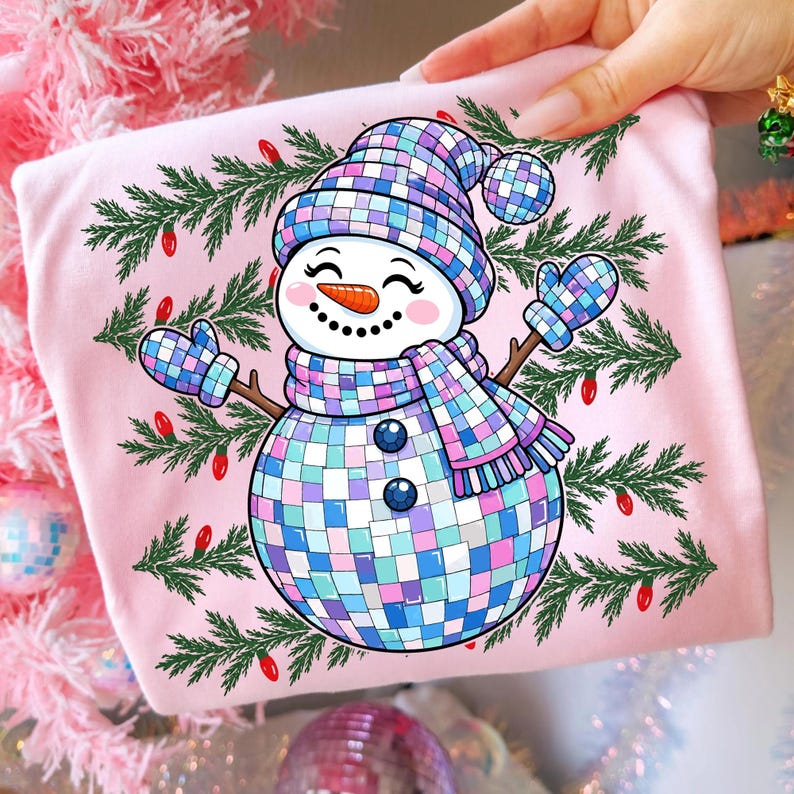 A custom-designed festive t-shirt featuring a colorful snowman graphic