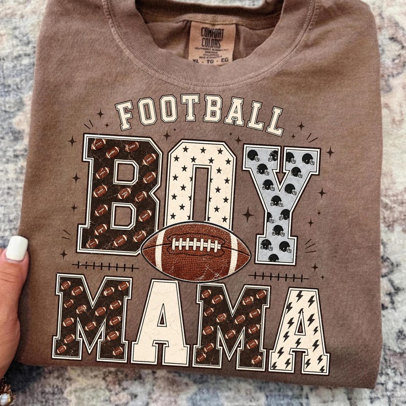 A close-up of a custom-designed football mom mug on a wooden table