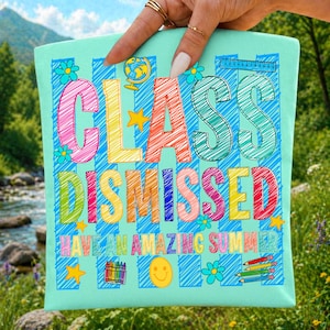 May include: A light mint green pouch featuring the text "CLASS DISMISSED" in large, multi-colored scribbled letters, with the phrase "HAVE AN AMAZING SUMMER" below. The design includes a globe, a ruler, crayons, stars, and flowers.