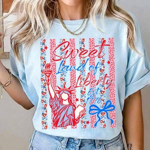 May include: A handmade wooden sign with the text "Welcome" in a playful font. The sign is painted white with a distressed finish, and features a decorative floral design in shades of pink and green. It measures approximately 12 inches wide.