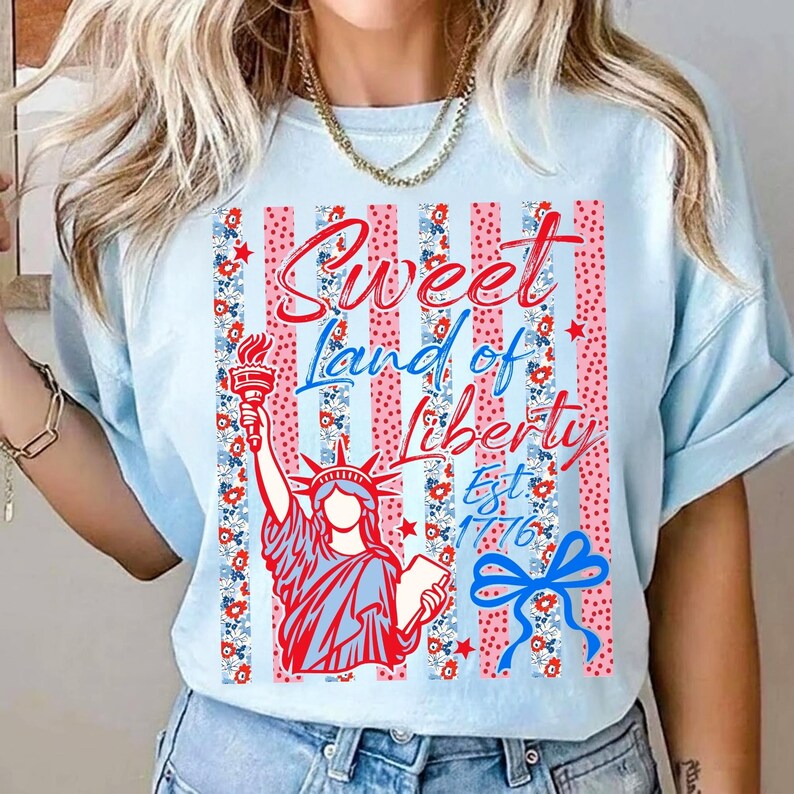 May include: A handmade wooden sign with the text "Welcome" in a playful font. The sign is painted white with a distressed finish, and features a decorative floral design in shades of pink and green. It measures approximately 12 inches wide.