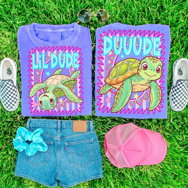 Mockup of a white t-shirt with the Duuude and Lil Dude turtle design, showcasing its use for family apparel.