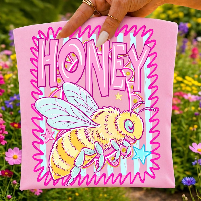 Close-up of the 'Be Kind' message with a cute retro striped bee, perfect for school clipart and inspirational apparel.