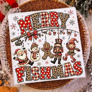 May include: A white square sign featuring the text MERRY FISHMAS in red polka dot and plaid leopard print letters. A fishing rod hangs ornaments including a snowman, gingerbread man, nutcracker, and elf, with Santa Claus on the left.