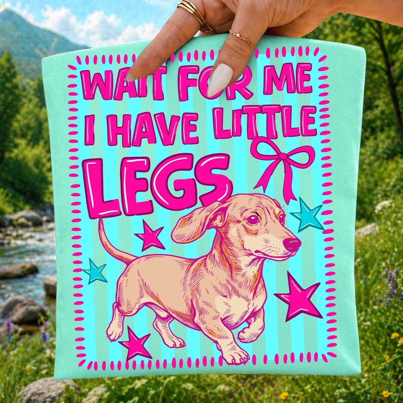 Dachshund 'Wait For Me I Have Little Legs' design on a white t-shirt