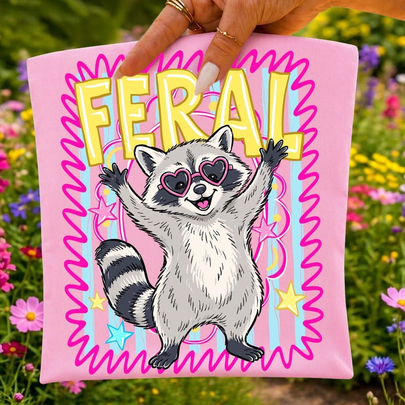 A t-shirt mockup showcasing the Sassy Racoon PNG design.