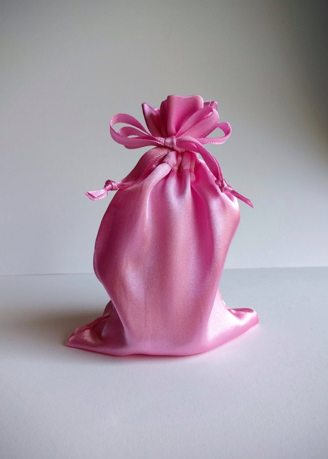 Pink satin drawstring bag hotsell