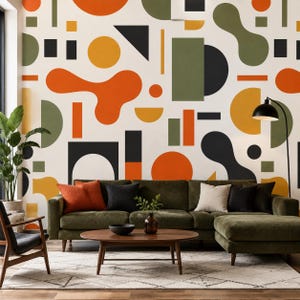 Pode incluir: Um mural de parede com um padrão geométrico repetitivo de círculos, retângulos, triângulos e formas orgânicas semelhantes a amebas em tons de laranja, verde-oliva, amarelo e preto sobre um fundo de cor creme.