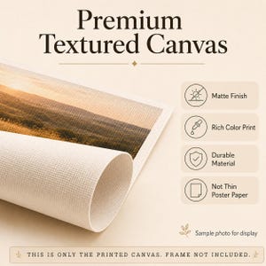 May include: A rolled piece of premium textured canvas featuring a landscape print. The text reads Premium Textured Canvas, Matte Finish, Rich Color Print, Durable Material, Not Thin Poster Paper, and This is only the printed canvas. Frame not included.