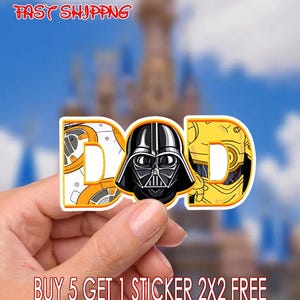 May include: A sticker with the word "DAD" featuring Star Wars characters BB-8, Darth Vader, and C-3PO. The sticker has a white border and is held in a hand. The text "FAST SHIPPING" and "BUY 5 GET 1 STICKER 2X2 FREE" are also visible.
