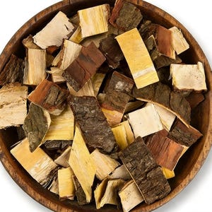 May include: A wooden bowl filled with various pieces of tree bark. The bark pieces are in shades of brown, tan, and yellow, with textured surfaces. The bowl is made of wood and has a natural finish. The image is a top-down view.