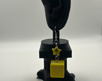 Op Mario Bros geïnspireerde oorbellen, vraagtekenblok en speciale ster