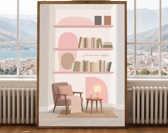 May include: A framed art print featuring a cozy reading nook scene. The artwork depicts a bookshelf with books, a chair, a small table with a lamp, and the text "...Just one more chapter."