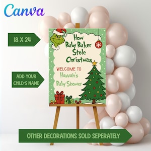 May include: A Christmas-themed baby shower sign on a wooden easel. The sign reads "How Baby Baker Stole Christmas" and "Welcome to Hannah's Baby Shower." The sign is decorated with a Grinch, Christmas tree, and gifts. The sign is 18 x 24 inches.